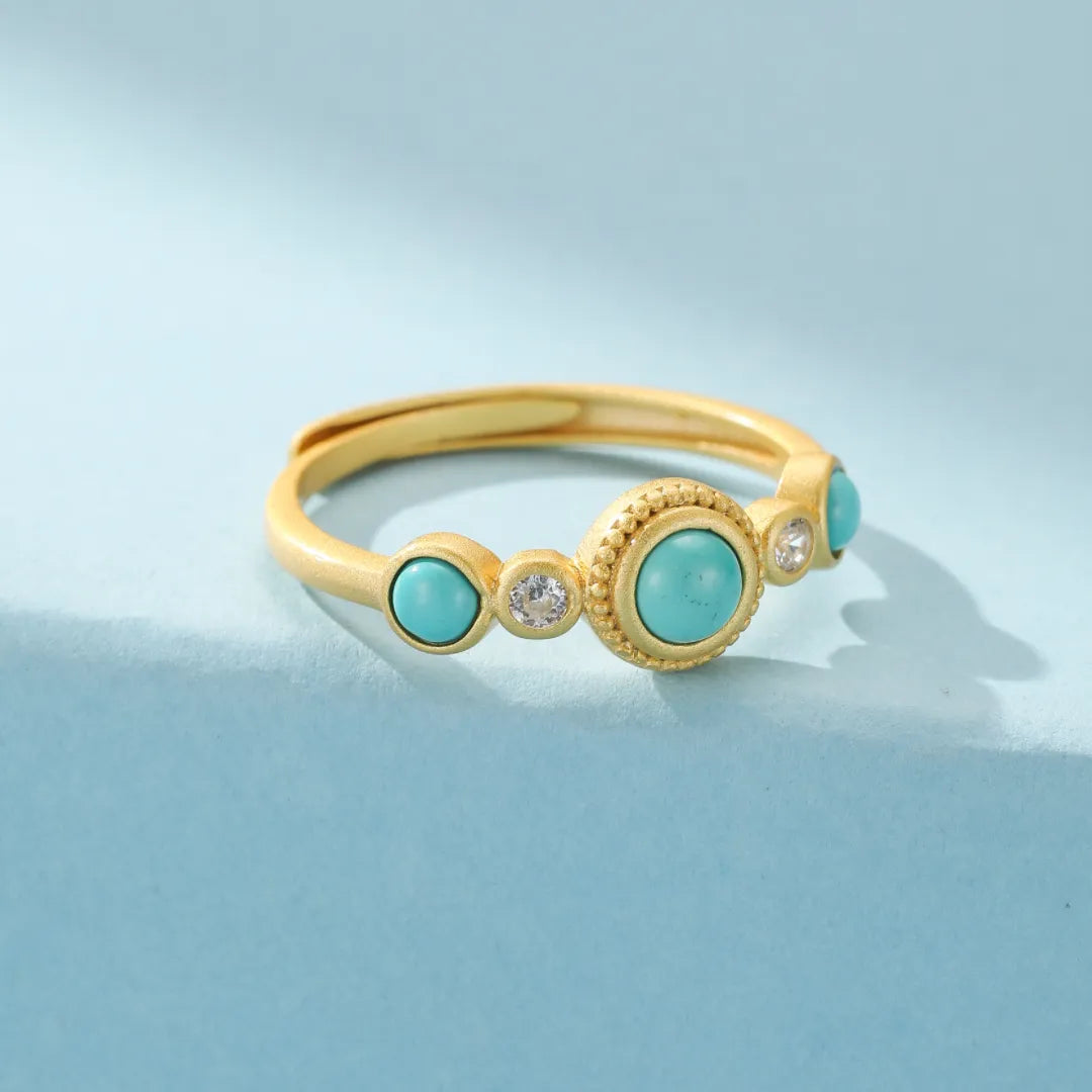 Bague en argent plaqué or avec turquoise et zircons, style bohème et désertique.