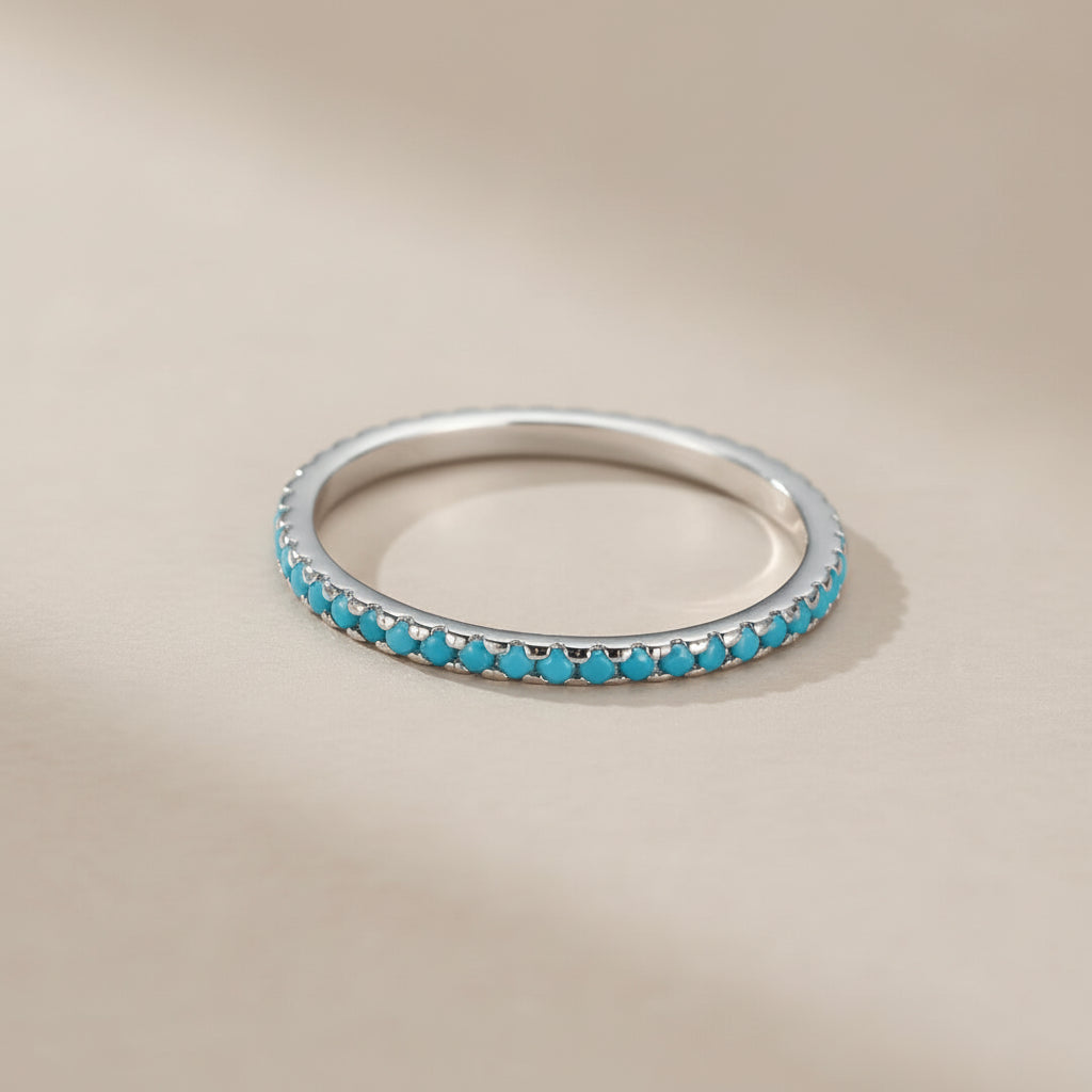 Bague fine en argent 925 sertie de petites pierres de turquoise bleues, modèle "Simplicité Céleste".