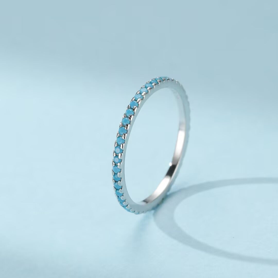 Bague fine en argent 925 sertie de petites pierres turquoise bleues, nom "Simplicité Céleste"
