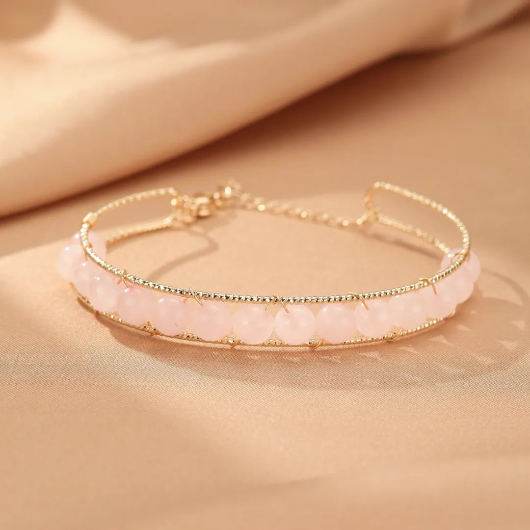 Bracelet doré avec des perles de quartz rose, création "Énergie Douce"