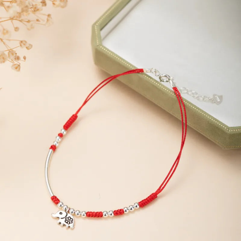 Bracelet de cheville "Petite Éléphant" en argent avec cordon rouge et perles argentées