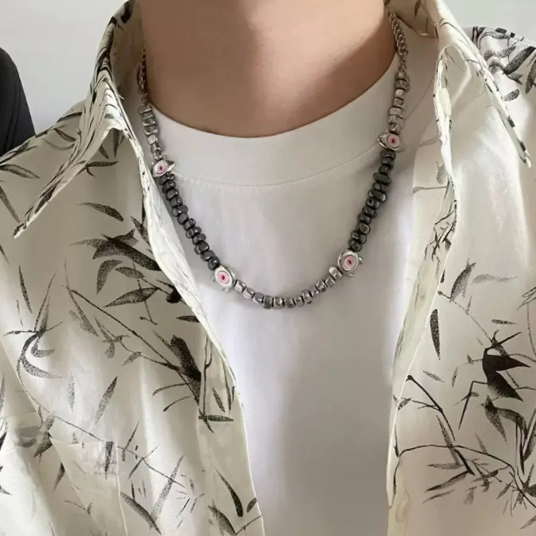 Collier pour homme avec des perles d'hématite et des pendentifs œil "Regard Hypnotique".