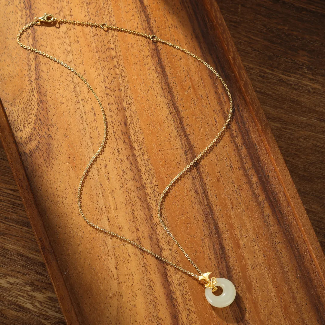 Ginkgo White Jade Necklace "Dance of Eternity" Gold-Plated Silver