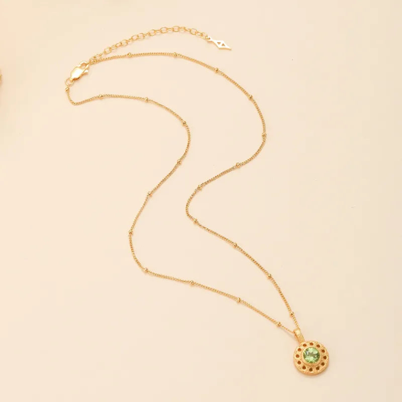 Peridot Necklace "Circle of Prosperity" Gold-Plated Silver