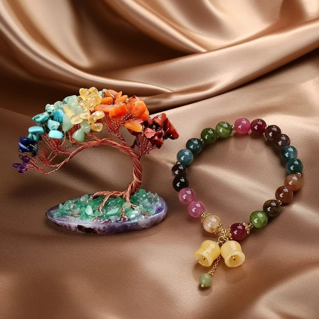 Coffret cadeau Harmonie avec un arbre de vie composé de pierres de 7 chakras et un bracelet assorti en pierres naturelles multicolores.