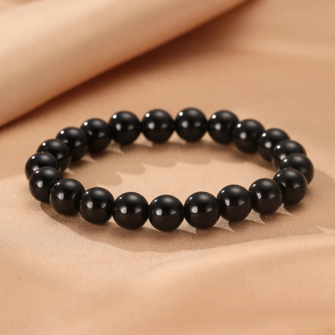 Bracelet en perles d'obsidienne noire naturelle, bijou de poignet pour hommes et femmes, style minimaliste et élégant.