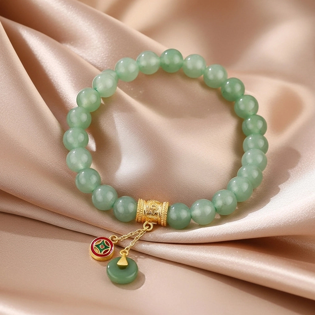 Bracelet en aventurine verte avec breloques dorées, arbre de vie et pièce de monnaie chinoise